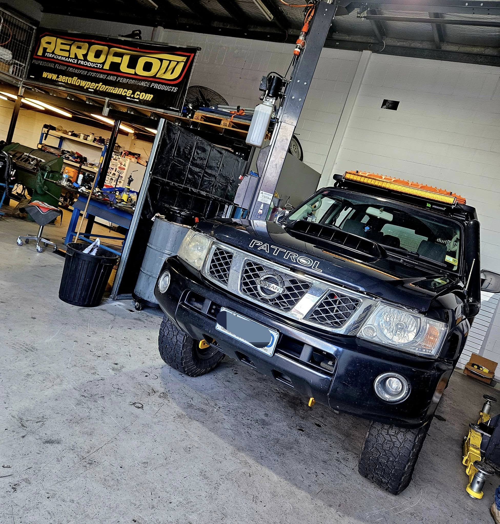 General mechanical service being performed on a vehicle in Hobart